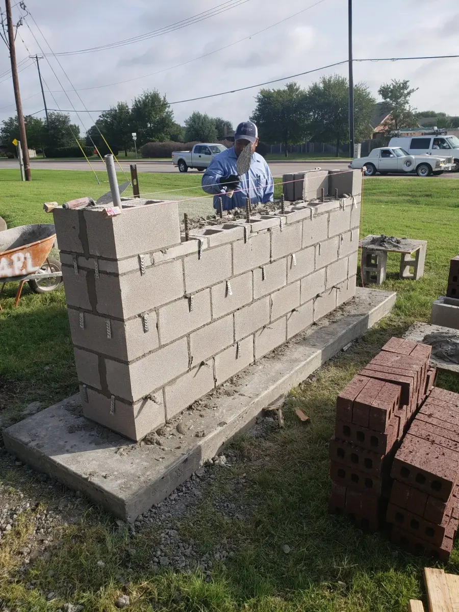 Concrete block retaining / sign wall